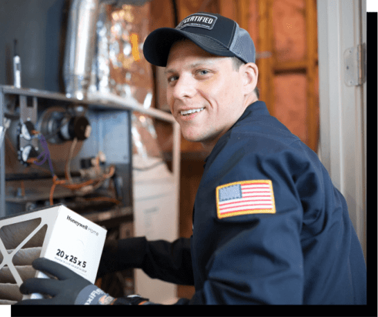 technician-holding-furnace-filter